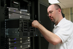 Man working on server – managed hosting services