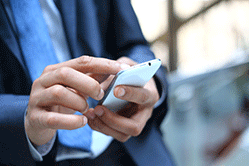 Are you ready for mobile commerce? - man using a mobile phone