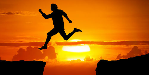 Man jumping over a gap